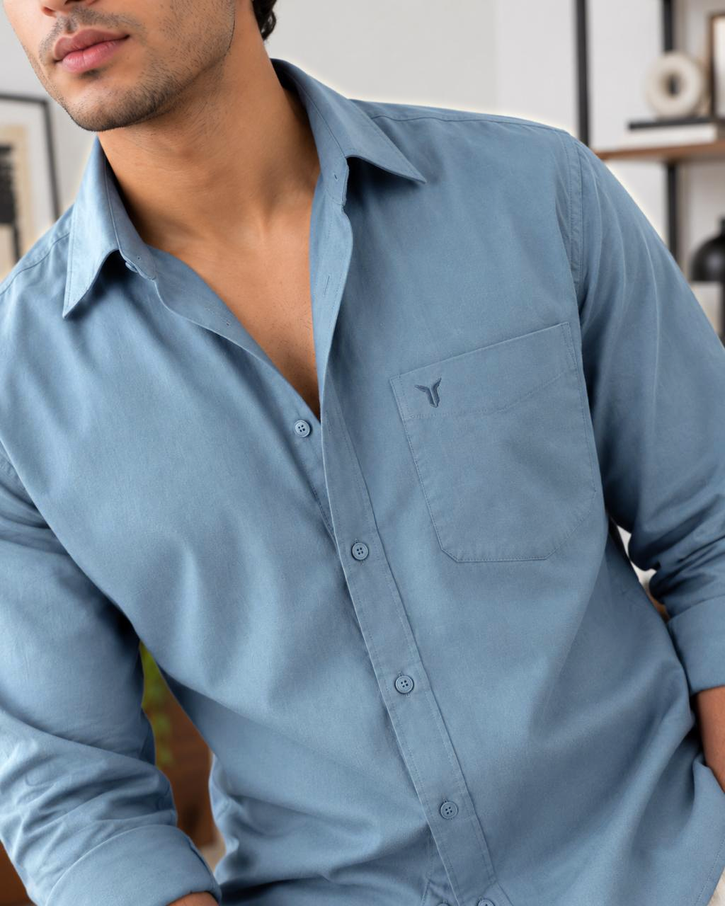 FORZE Twill Stretch Shirt in Dusty Blue, chest detail showing the patch pocket and tonal embroidered mark